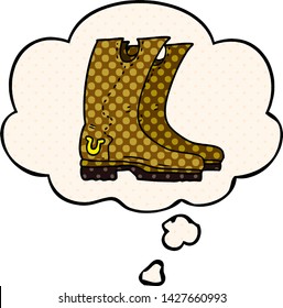 cartoon cowboy boots with thought bubble in comic book style