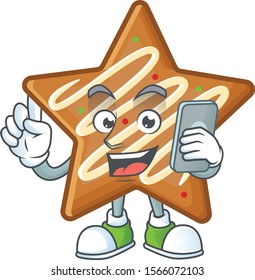 Cartoon crispy star cookies with the character with holding phone