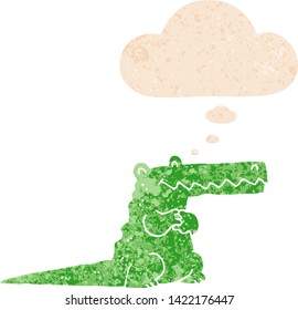 cartoon crocodile with thought bubble in grunge distressed retro textured style
