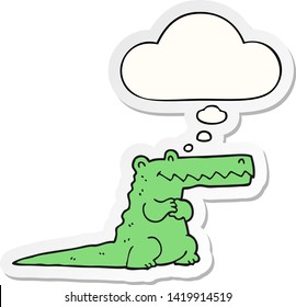 cartoon crocodile with thought bubble as a printed sticker