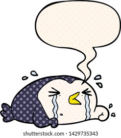 cartoon crying penguin with speech bubble in comic book style