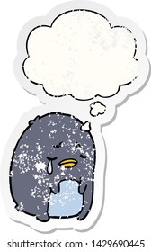cartoon crying penguin with thought bubble as a distressed worn sticker