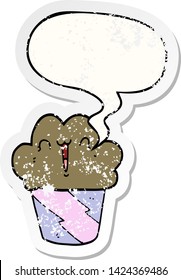 Cartoon-Cupcakes mit Gesicht mit Sprachblase bedrückt alten Aufkleber