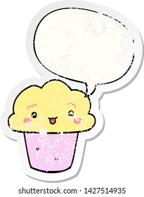 cartoon cupcake with face with speech bubble distressed distressed old sticker