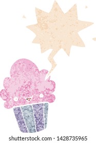 cartoon cupcake with face with speech bubble in grunge distressed retro textured style