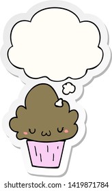 cartoon cupcake with face with thought bubble as a printed sticker
