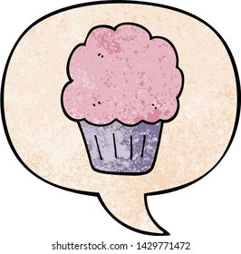 cartoon cupcake with speech bubble in retro texture style