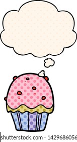 cartoon cupcake with thought bubble in comic book style