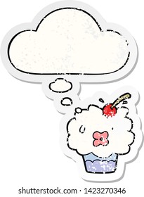 cartoon cupcake with thought bubble as a distressed worn sticker