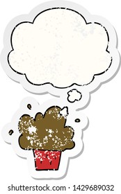 cartoon cupcake with thought bubble as a distressed worn sticker