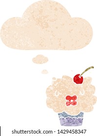 cartoon cupcake with thought bubble in grunge distressed retro textured style