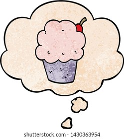 cartoon cupcake with thought bubble in grunge texture style