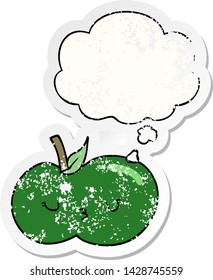 cartoon cute apple with thought bubble as a distressed worn sticker