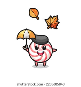 cartoon of the cute candy holding an umbrella in autumn , cute style design for t shirt, sticker, logo element