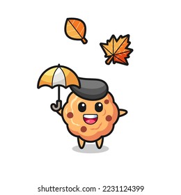 cartoon of the cute chocolate chip cookie holding an umbrella in autumn , cute style design for t shirt, sticker, logo element