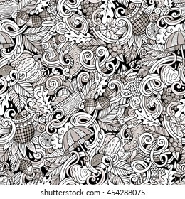Cartoon cute doodles hand drawn autumn seamless pattern. Monochrome detailed, with lots of objects background. Endless funny vector illustration. Line art backdrop with fall season symbols and items