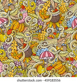 Cartoon cute doodles hand drawn autumn seamless pattern. Colorful detailed, with lots of objects background. Endless funny vector illustration. Color backdrop with fall season symbols and items