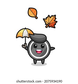 cartoon of the cute hockey puck holding an umbrella in autumn , cute style design for t shirt, sticker, logo element