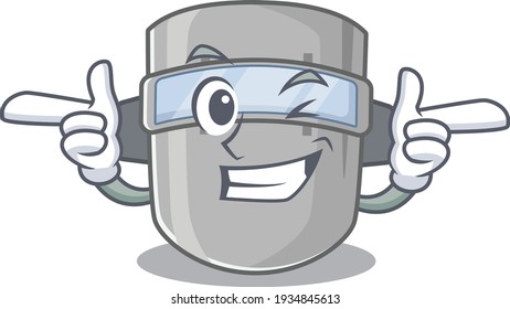 Cartoon design of welding mask showing funny face with wink eye