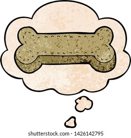 cartoon dog biscuit with thought bubble in grunge texture style