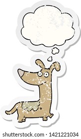 cartoon dog with thought bubble as a distressed worn sticker