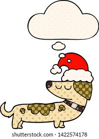 cartoon dog wearing christmas hat with thought bubble in comic book style