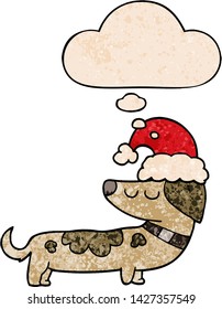 cartoon dog wearing christmas hat with thought bubble in grunge texture style