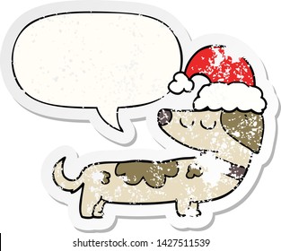 cartoon dog wearing christmas hat with speech bubble distressed distressed old sticker