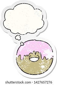 caricatura de donut con burbuja de pensamiento como pegatina gastada angustiada