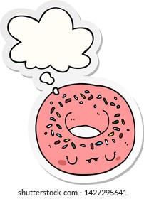 caricatura de donut con burbuja de pensamiento como pegatina impresa