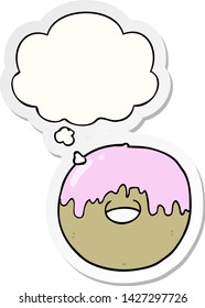 cartoon donut with thought bubble as a printed sticker