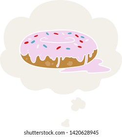cartoon donut with thought bubble in retro style