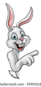 A Cartoon Easter Bunny Or Rabbit Pointing Around A Sign