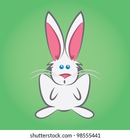 Cartoon easter bunny sitting in front of green background