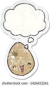 cartoon egg with thought bubble as a distressed worn sticker