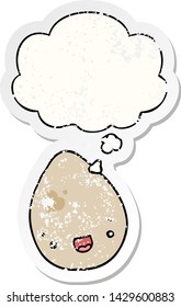 Cartoon-Ei mit Denkblase als bedrückter abgenutzter Aufkleber