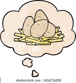 cartoon eggs in nest with thought bubble in grunge texture style