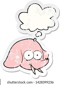 cartoon elephant face with thought bubble as a distressed worn sticker
