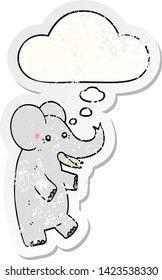cartoon elephant with thought bubble as a distressed worn sticker