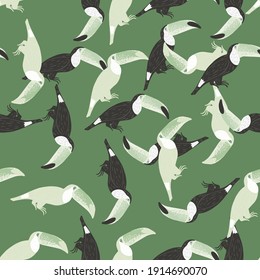 Cartoon exotic seamless pattern with random toucan bird shapes. Green pastel background. Flat vector print for textile, fabric, giftwrap, wallpapers. Endless illustration.