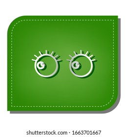 Cartoon eyes with eyelashes. Looking to the left. Silver gradient line icon with dark green shadow at ecological patched green leaf. Illustration.