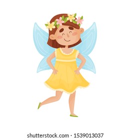 Cartoon fairy in a yellow dress dancing. Vector illustration on a white background.
