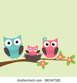 Cartoon family of owls sitting on a blooming branch