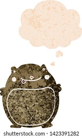 cartoon fat bear with thought bubble in grunge distressed retro textured style