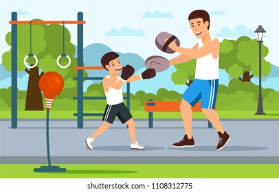 Cartoon father in boxer shorts on playground teaches son boxing. City in background.