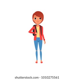 Cartoon female character in red jacket, yellow t-shirt and blue jeans. Girl with brown hair and with backpack on shoulders. Stylish teenage clothes. Flat vector design