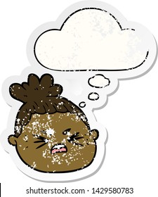 cartoon female face with thought bubble as a distressed worn sticker