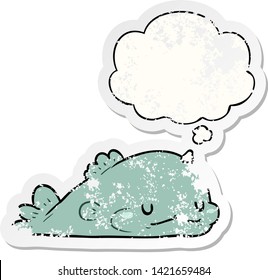 cartoon fish with thought bubble as a distressed worn sticker