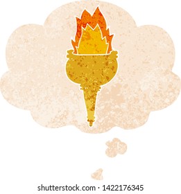 cartoon flaming torch with thought bubble in grunge distressed retro textured style