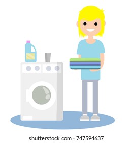 cartoon flat illustration - guy blonde in blue dress with a folded linen with a washing machine and detergent
